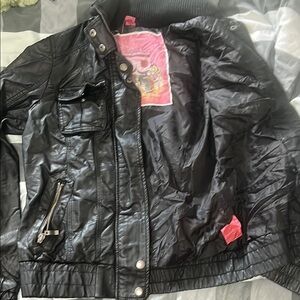 Sleek Black Jacket with Zipper Accents